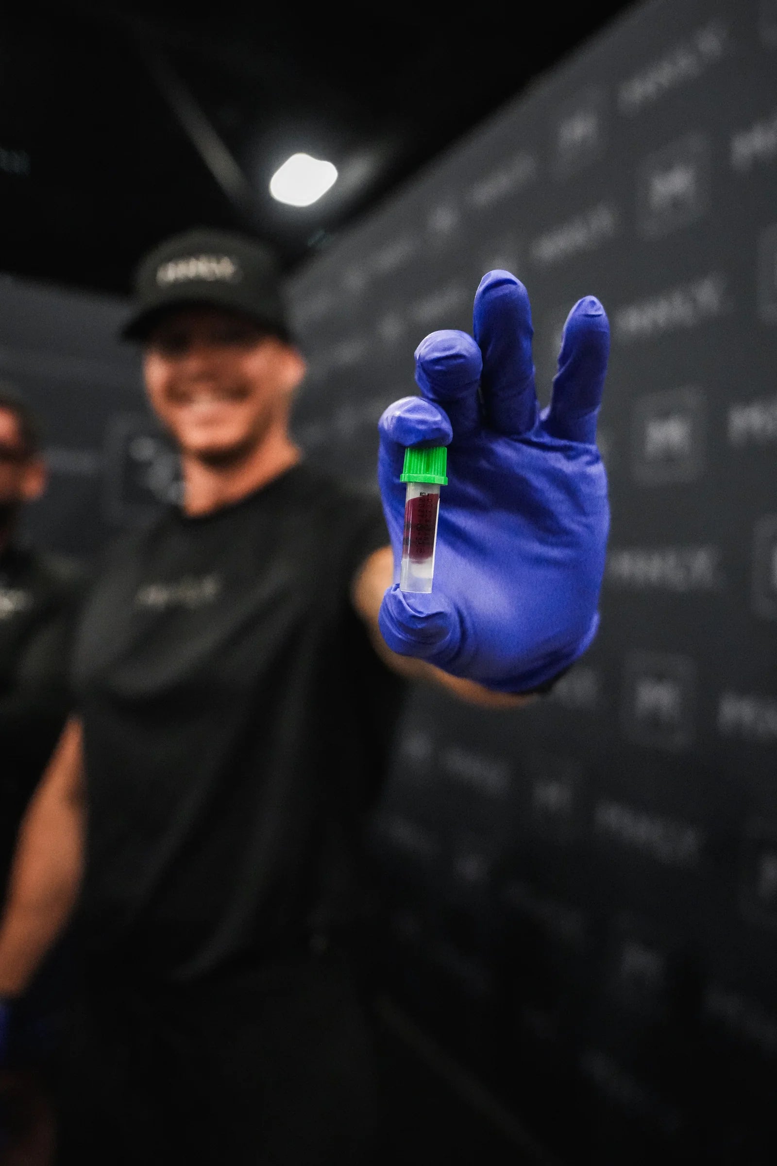 MNLY device drawing a capillary sample on the upper arm